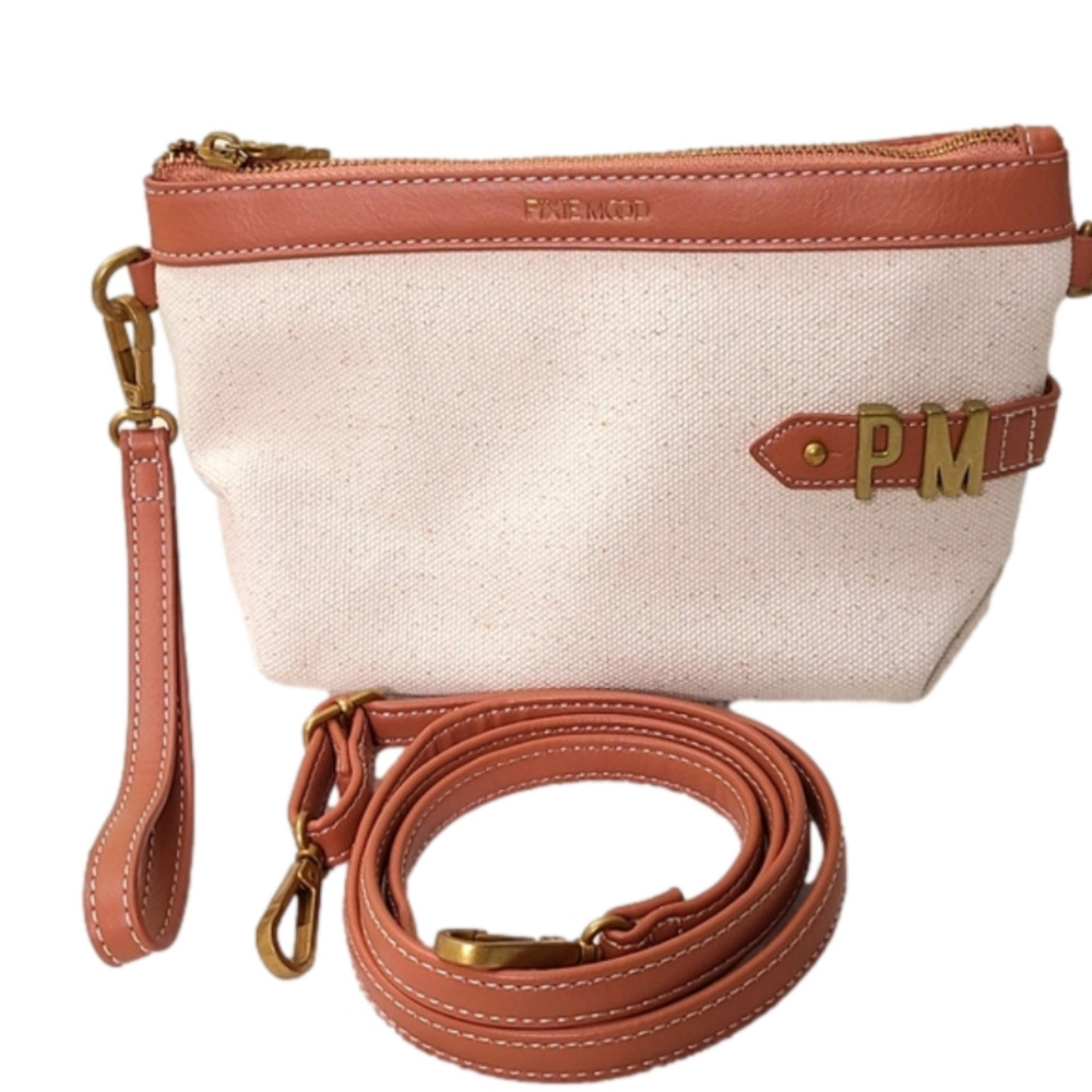 Pixie Mood cream colored crossbody/wristlet bag with leather trims